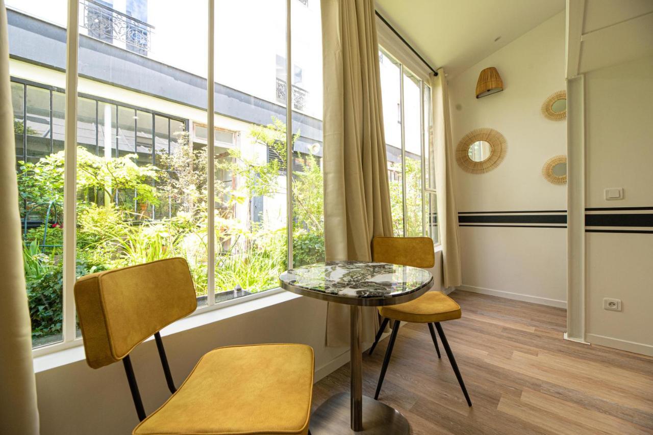 Loft In Paris Apartment Bagian luar foto